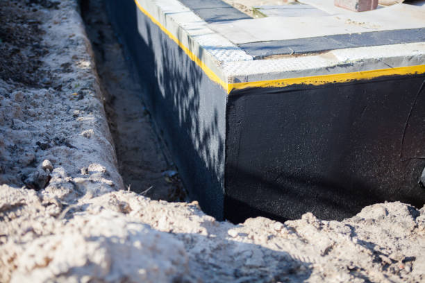 Professional Foundation Crack Repair technician working in Dupont, PA